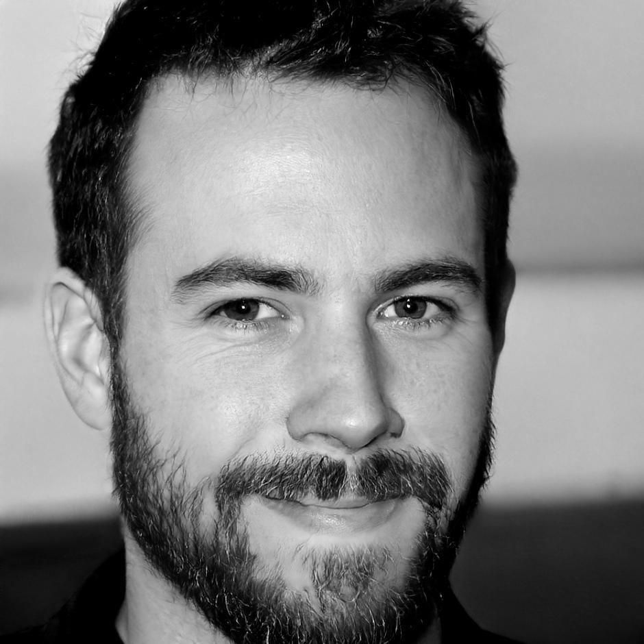 Webinar host portrait showing professional financial advisor ready to guide interactive learning session